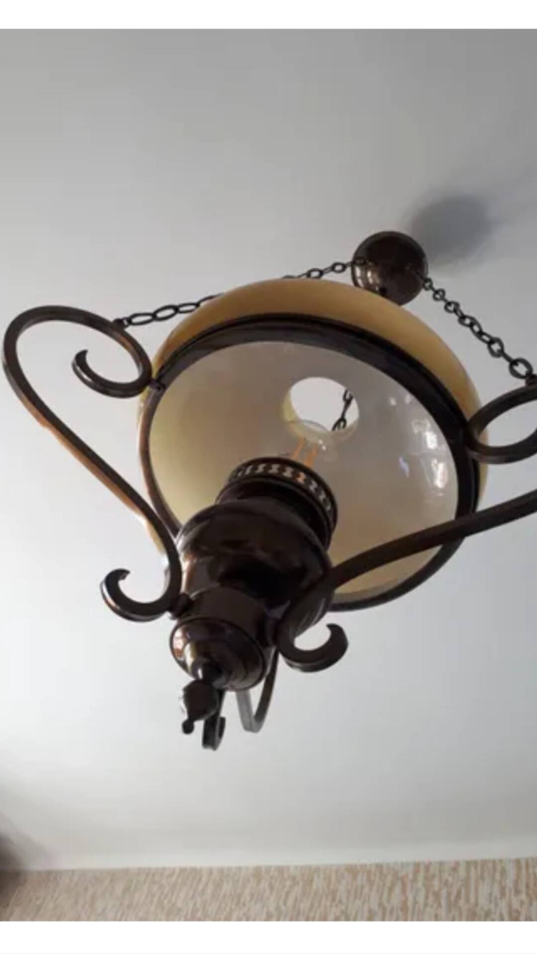Wrought iron chandelier amber glass