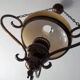 Wrought iron chandelier amber glass