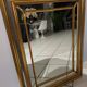 Mirror in gold and silver color