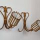 Rattan wall lights by Louis Sognot