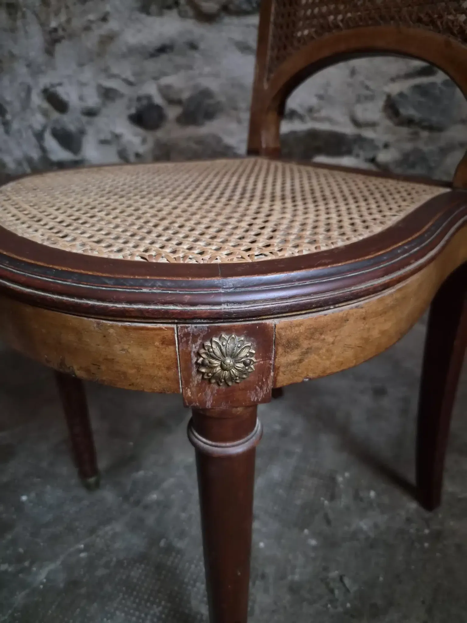 Set of 6 antique Louis XVI style dining chairs with caning.