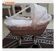 Rattan doll's cradle