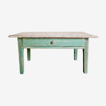 Wooden farmhouse coffee table green base