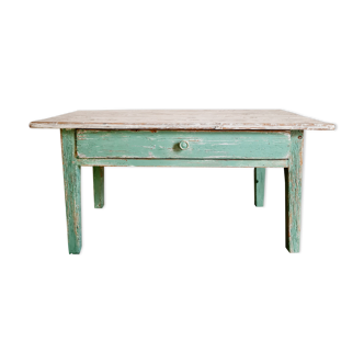 Wooden farmhouse coffee table green base