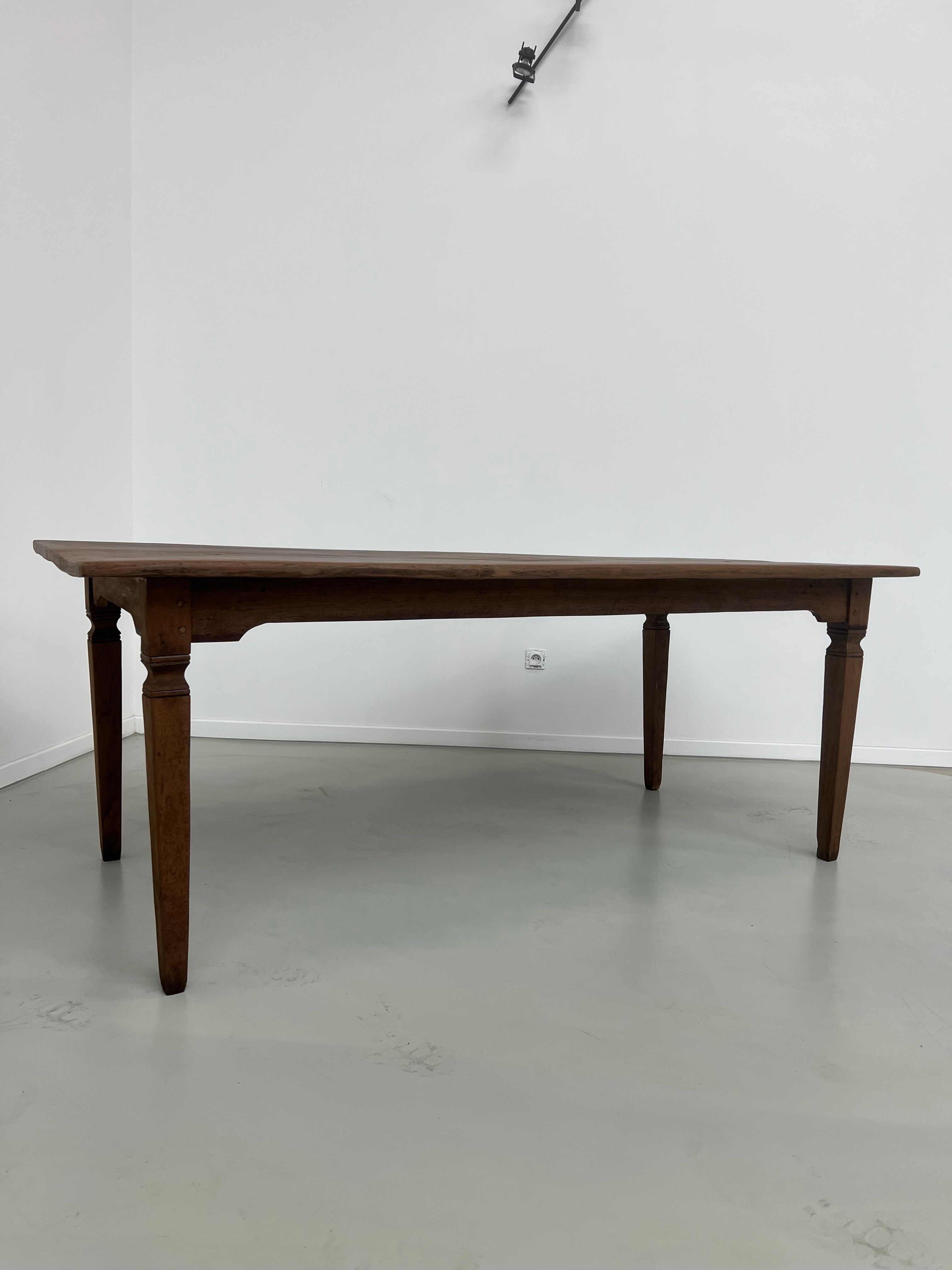 Teak dining table with spindle legs, 50s