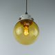 Vintage Mid-Century Modern Industrial Amber Glass And Brass Metal Lamp