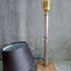 Golden metal lamp with pink marble base