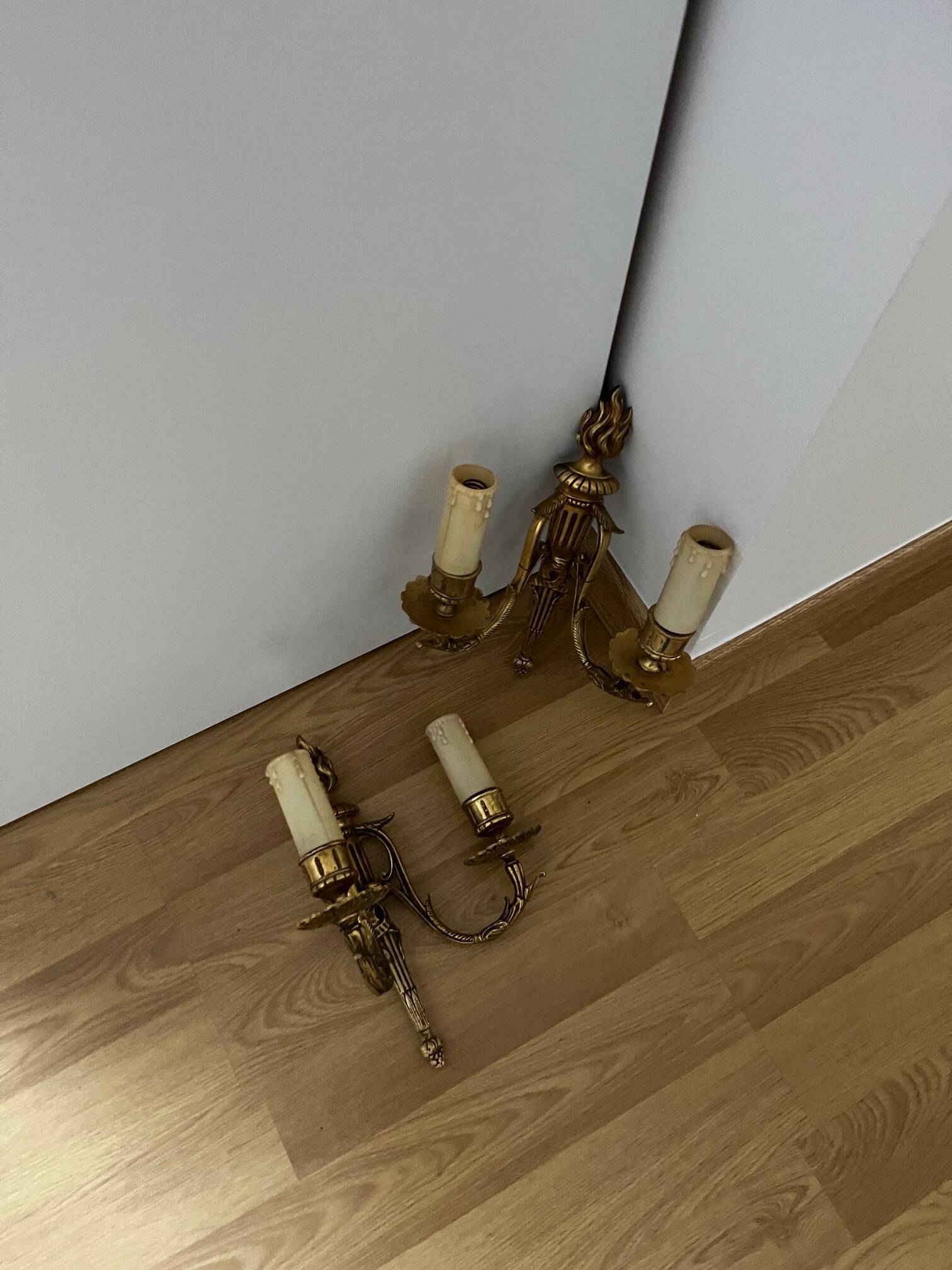 Pair of Louis XVI style bronze wall lights