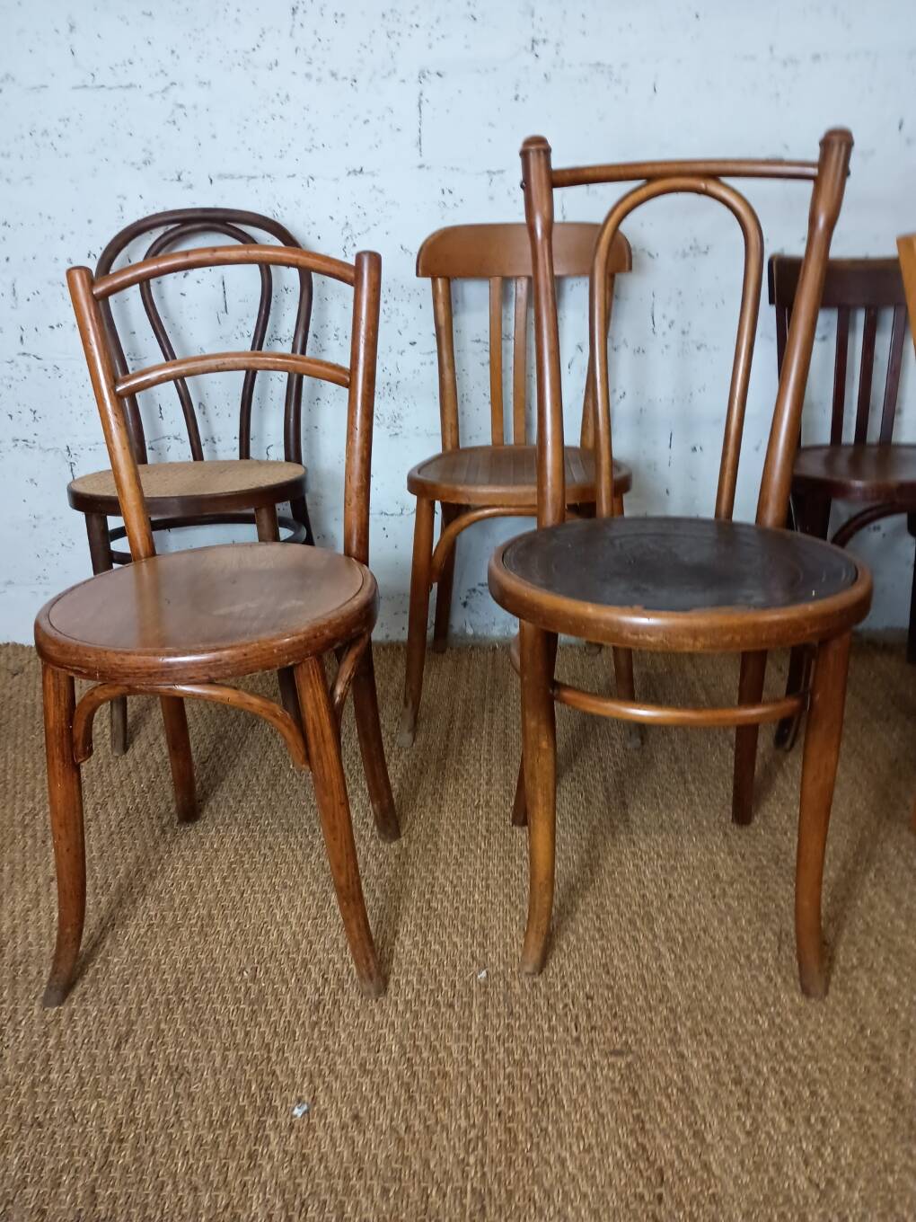 Set of 8 mismatched vintage Fischel bistro chairs