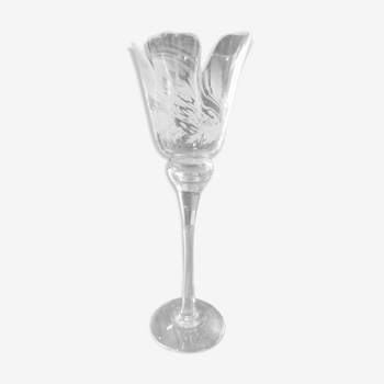 Candle holder high on foot in tulip shaped glass