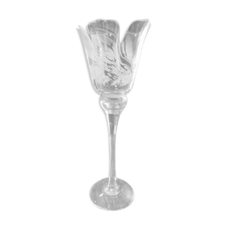 Candle holder high on foot in tulip shaped glass