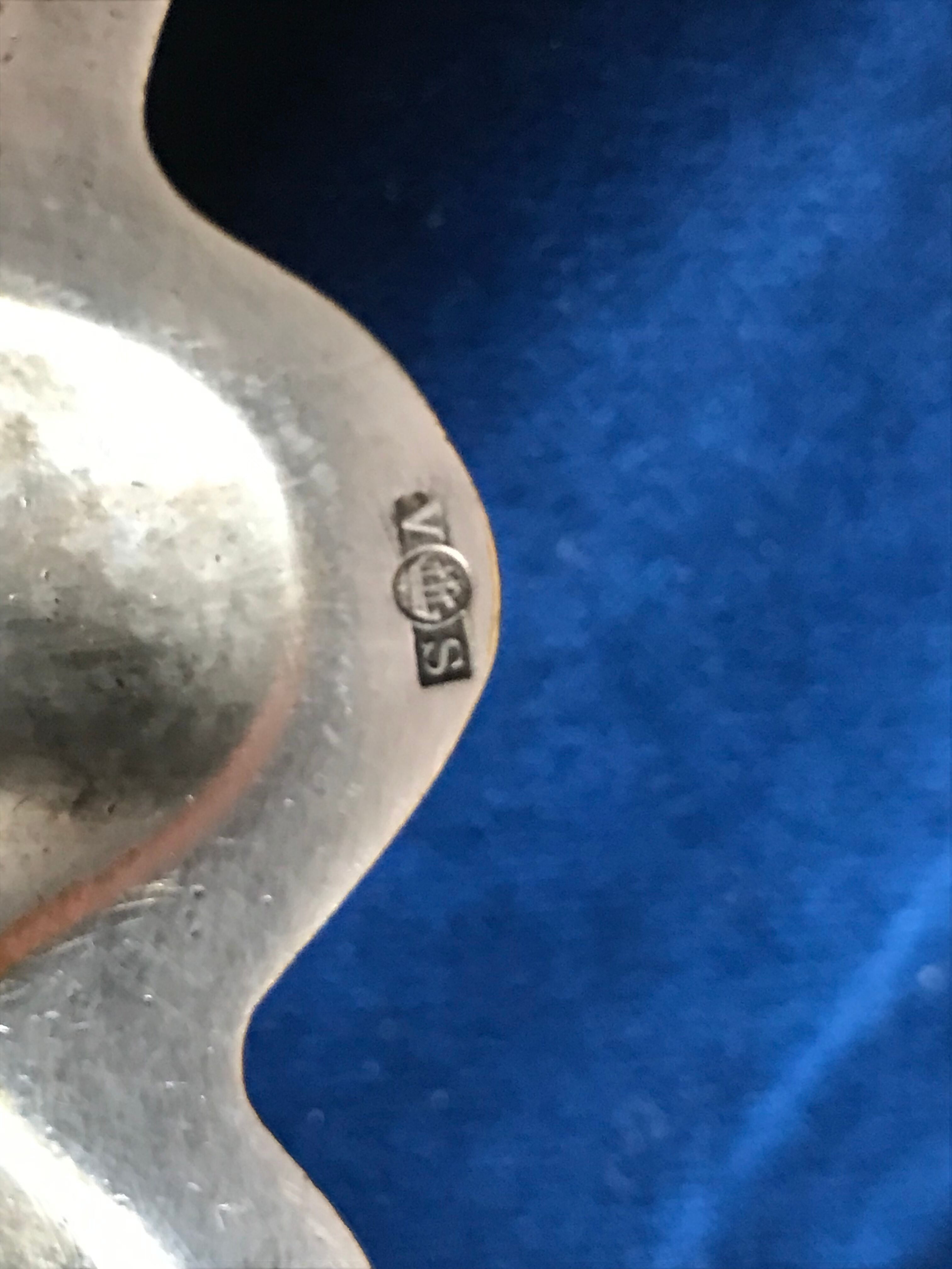 Old beggar in silver bronze