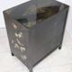 Black lacquered Chinese buffet with stone and ivory figures