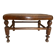 Low wooden stool with caning, footrest.