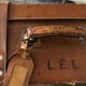 Former leather trunk with Louis Vuitton label holder