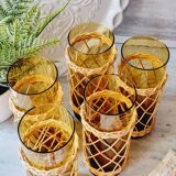 Carafe and glasses in blown amber glass and wicker