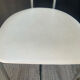 Vintage 70s chair in chrome metal and white faux leather.