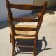 Fauteuil traditionnel en bois et paille