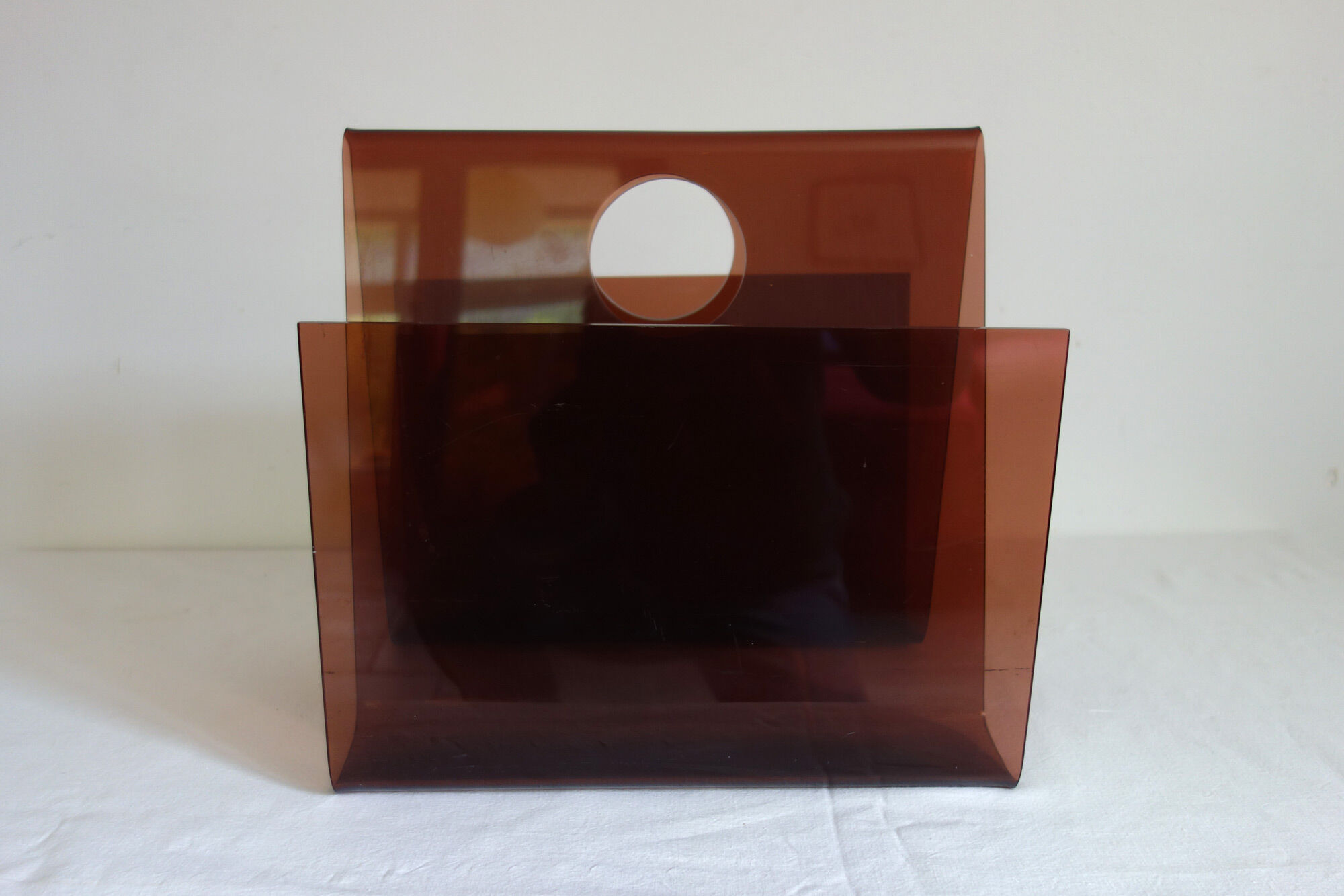 Smoked plexiglass magazine holder, 70s
