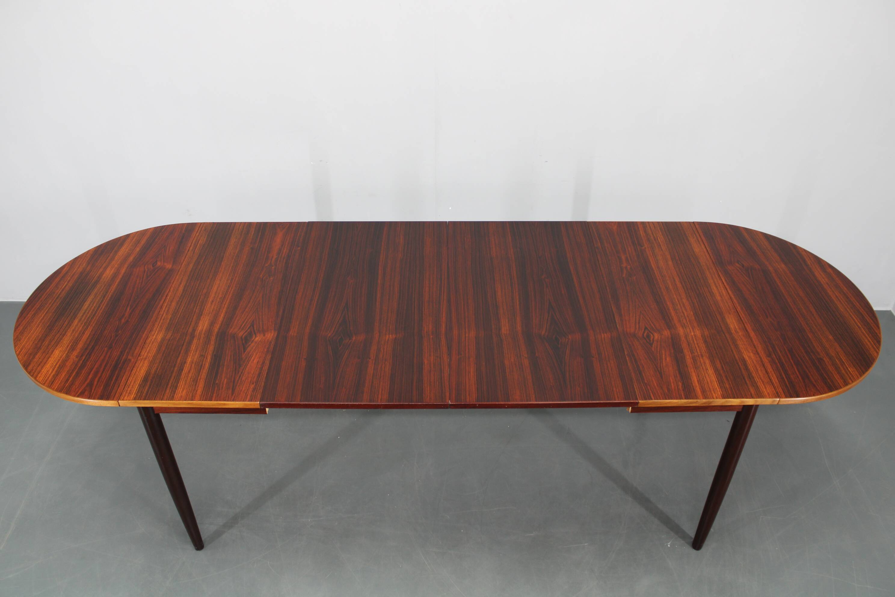 1960s Danish extendable palisander dining table, 4 leaves, restored