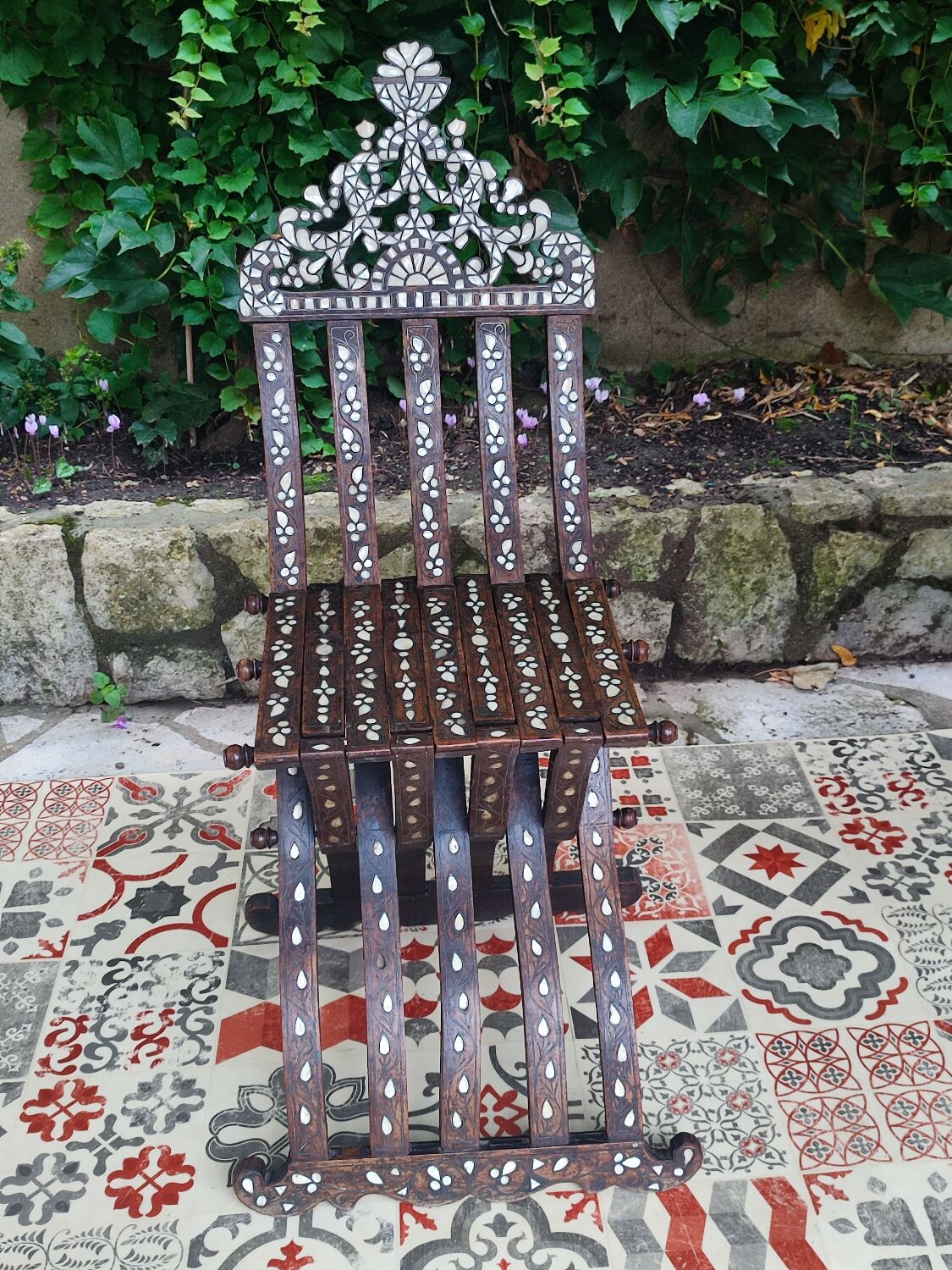 Antique folding oriental chair with mother-of-pearl inlays