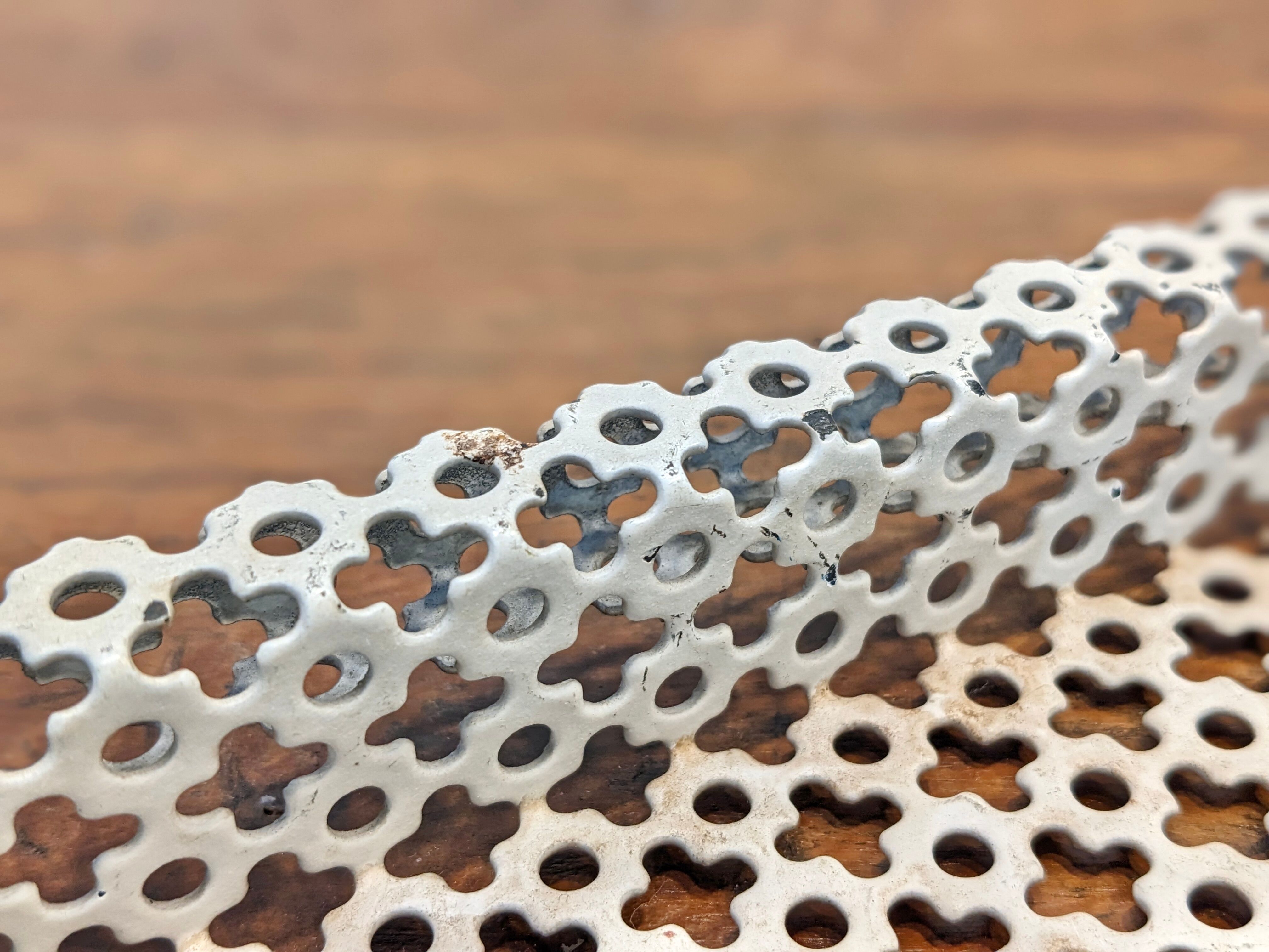 Top in white lacquered metal mathieu mategot