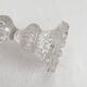 Antique baluster-shaped molded glass candlestick holder