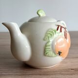 Slush teapot with embossed fruit decoration