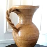 Sandstone jug with twisted handle