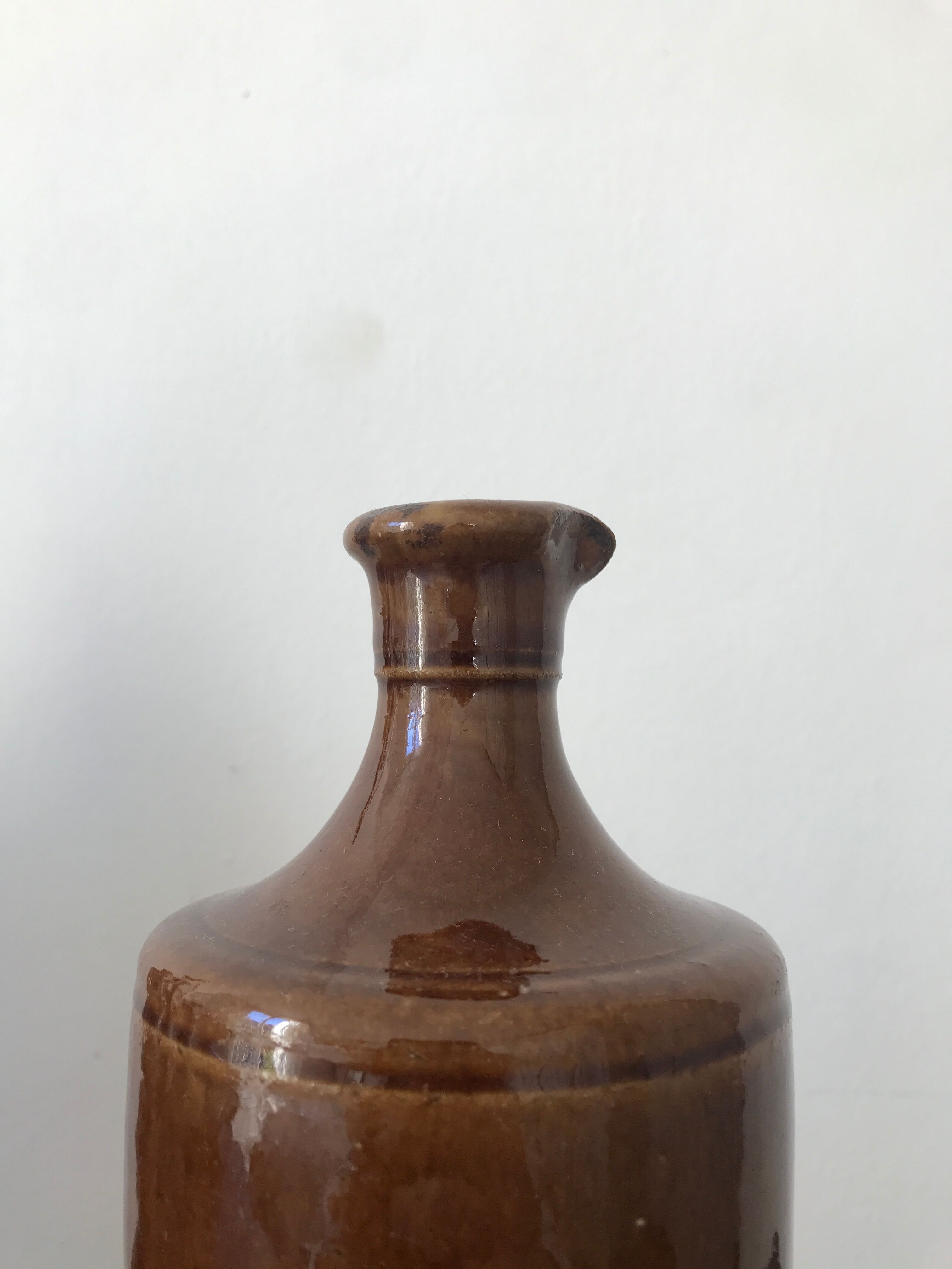 Pair of sandstone bottles