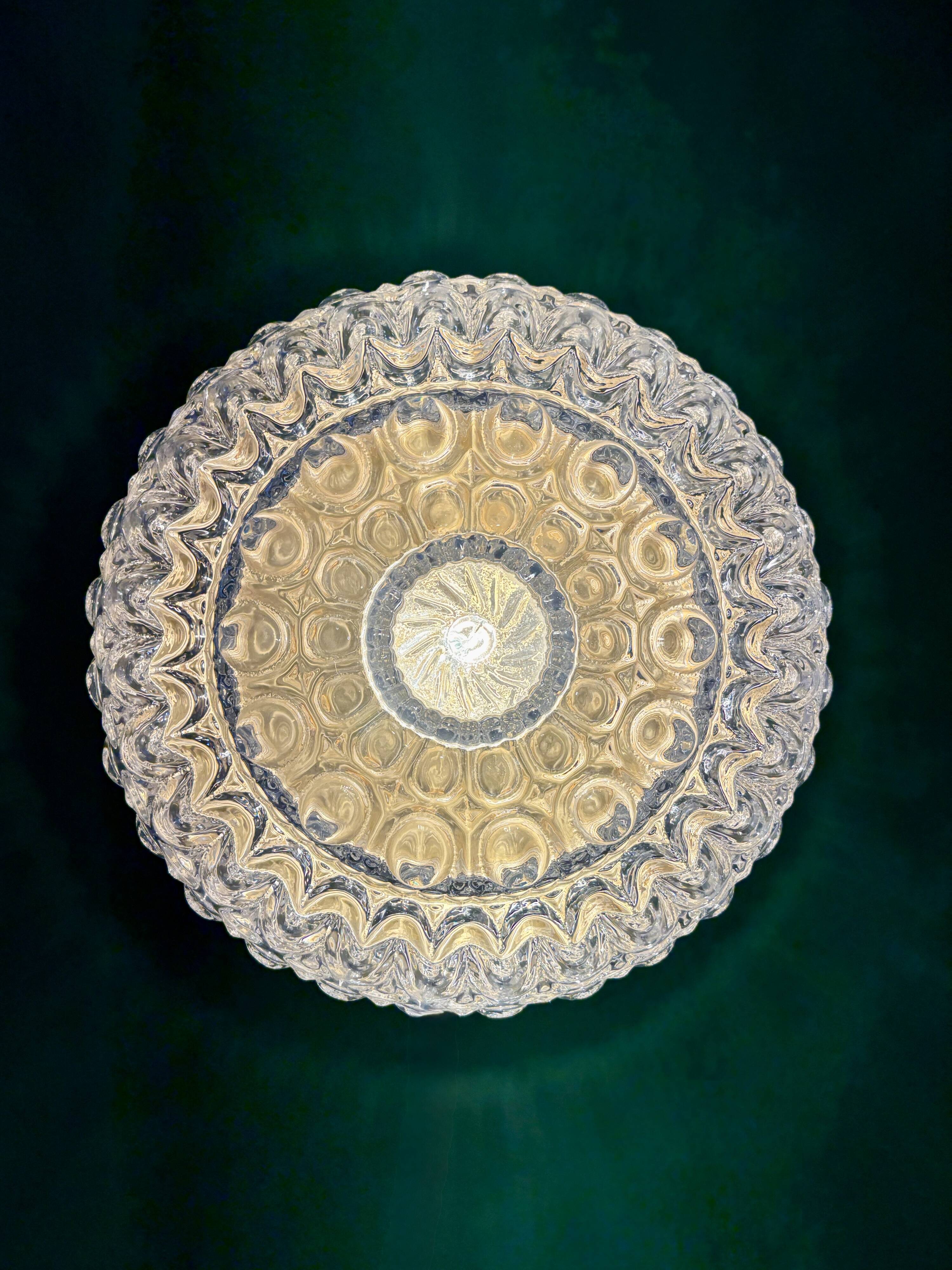 Vintage globe wall or ceiling light in molded glass