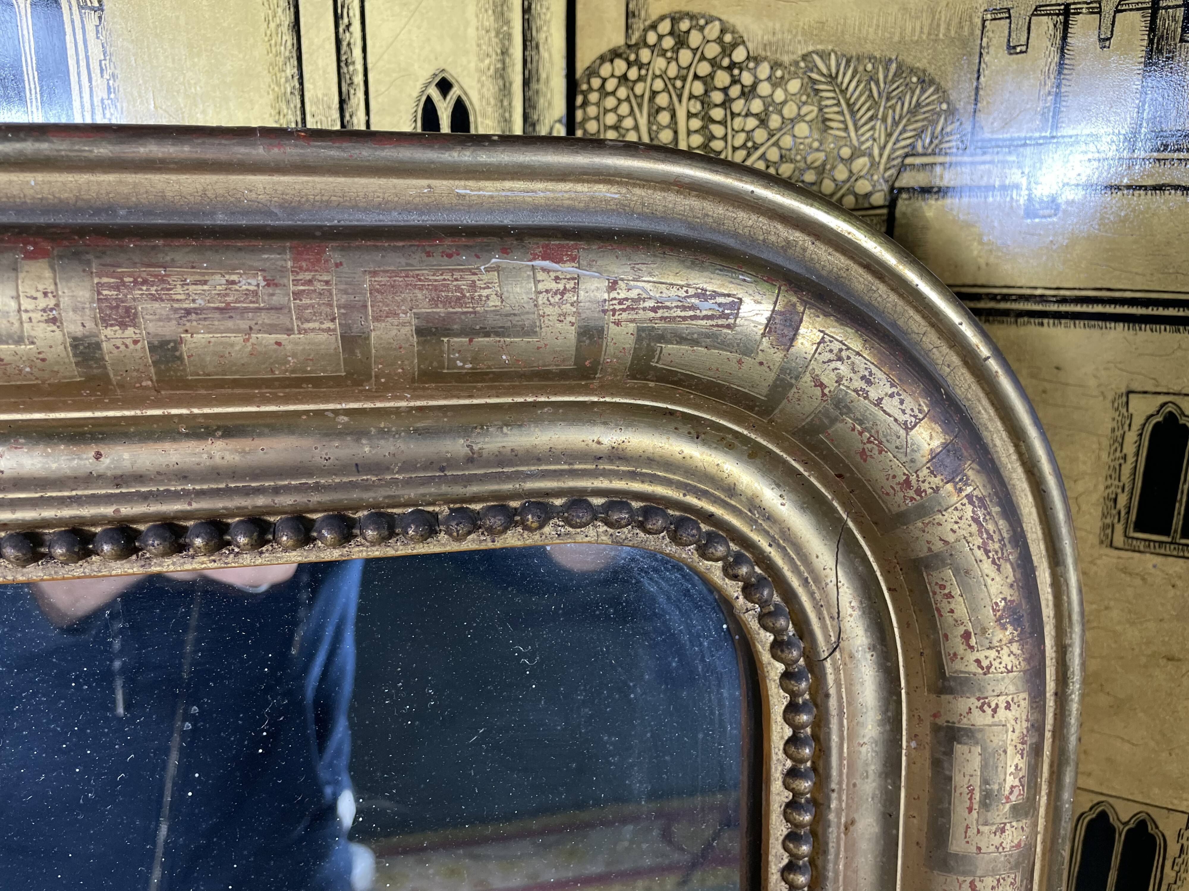 Louis Philippe period mirror with gold leaf