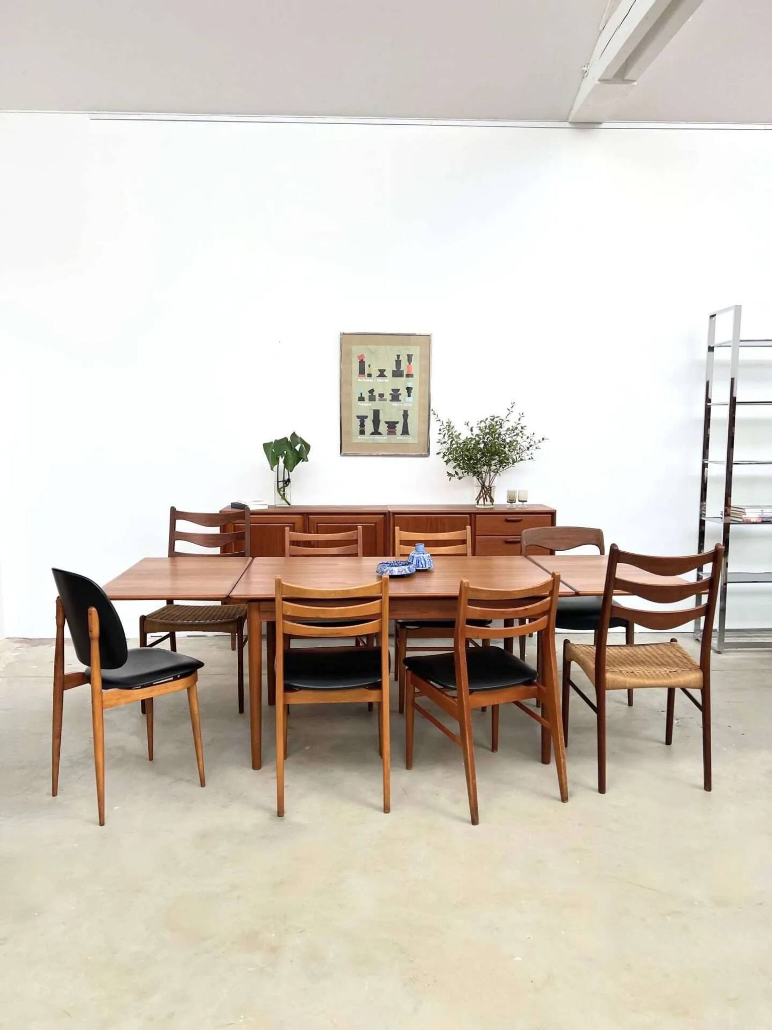 Teak dining table with integrated extensions — Scandinavian