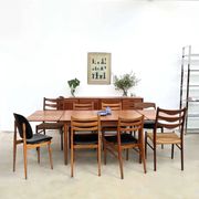 Teak dining table with integrated extensions — Scandinavian