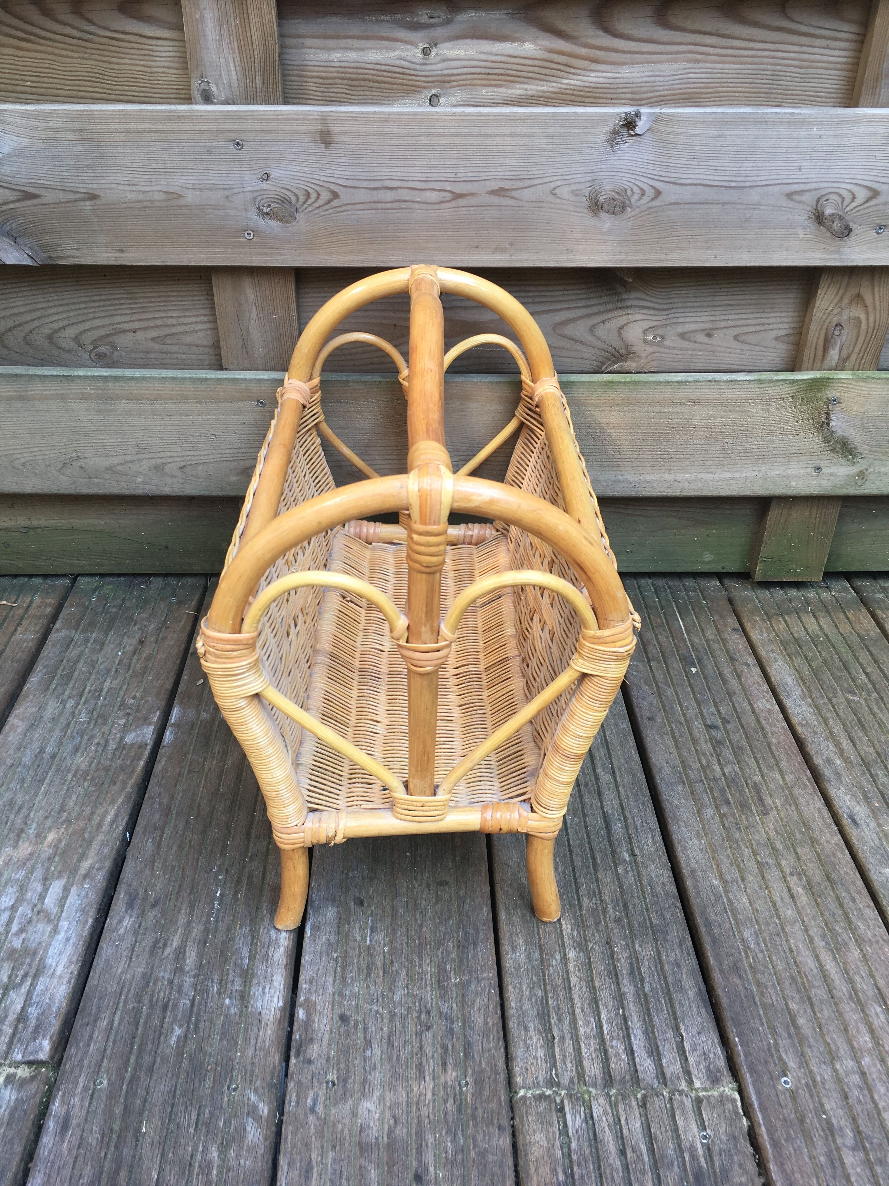 Old rattan magazine rack