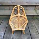 Old rattan magazine rack