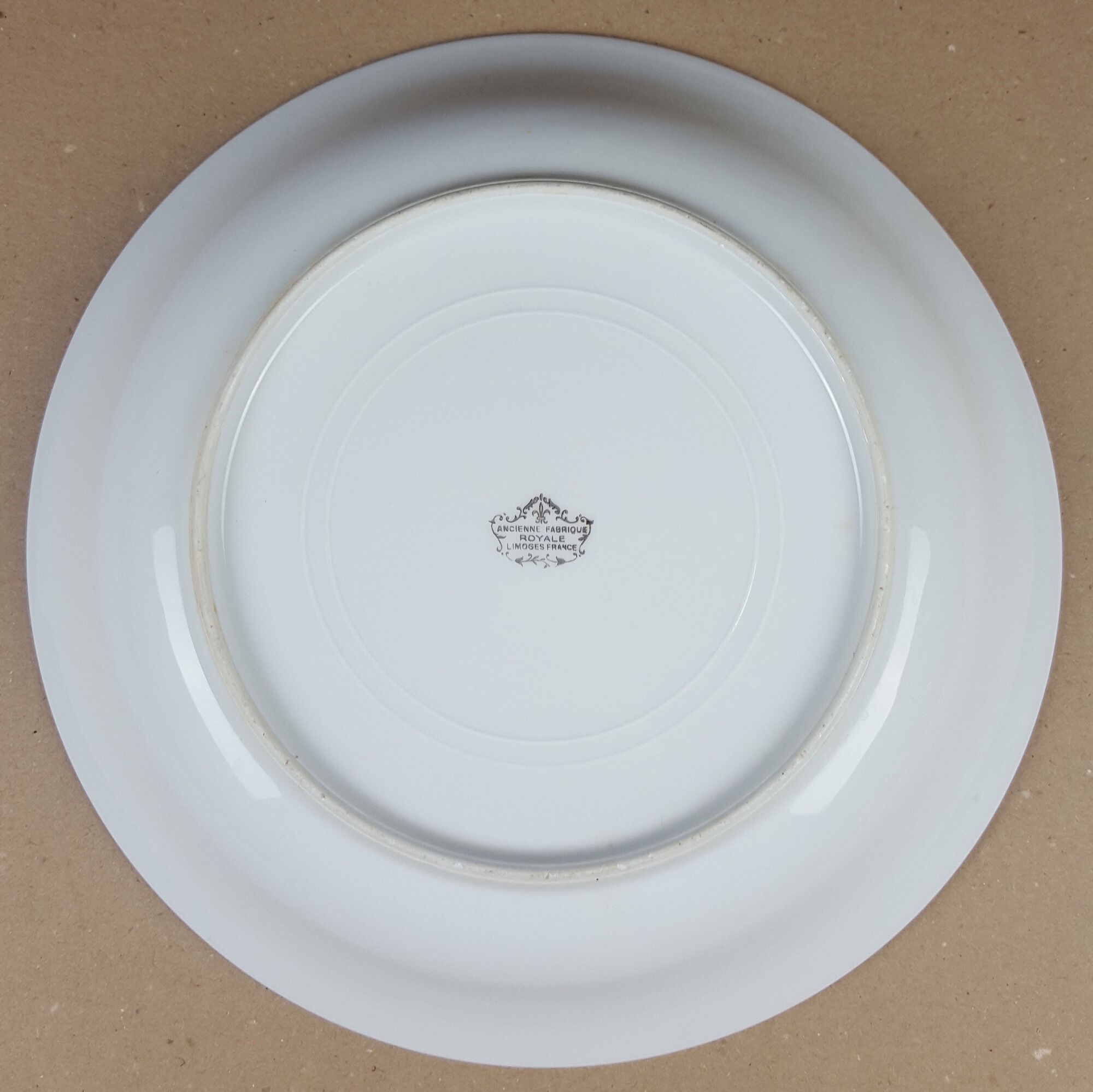 Large round porcelain dish Limoges France gilding gold edging