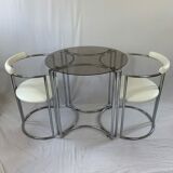 Chrome table and two modernist chairs