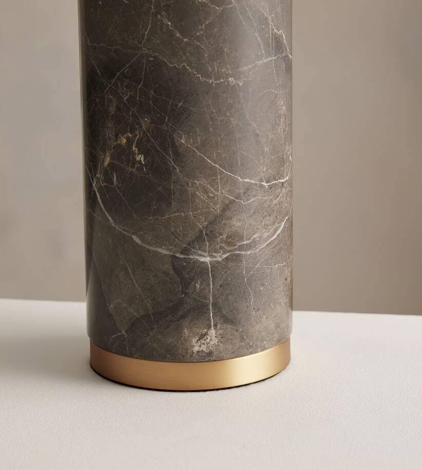 The Remi table lamp in red marble from Soho Home.