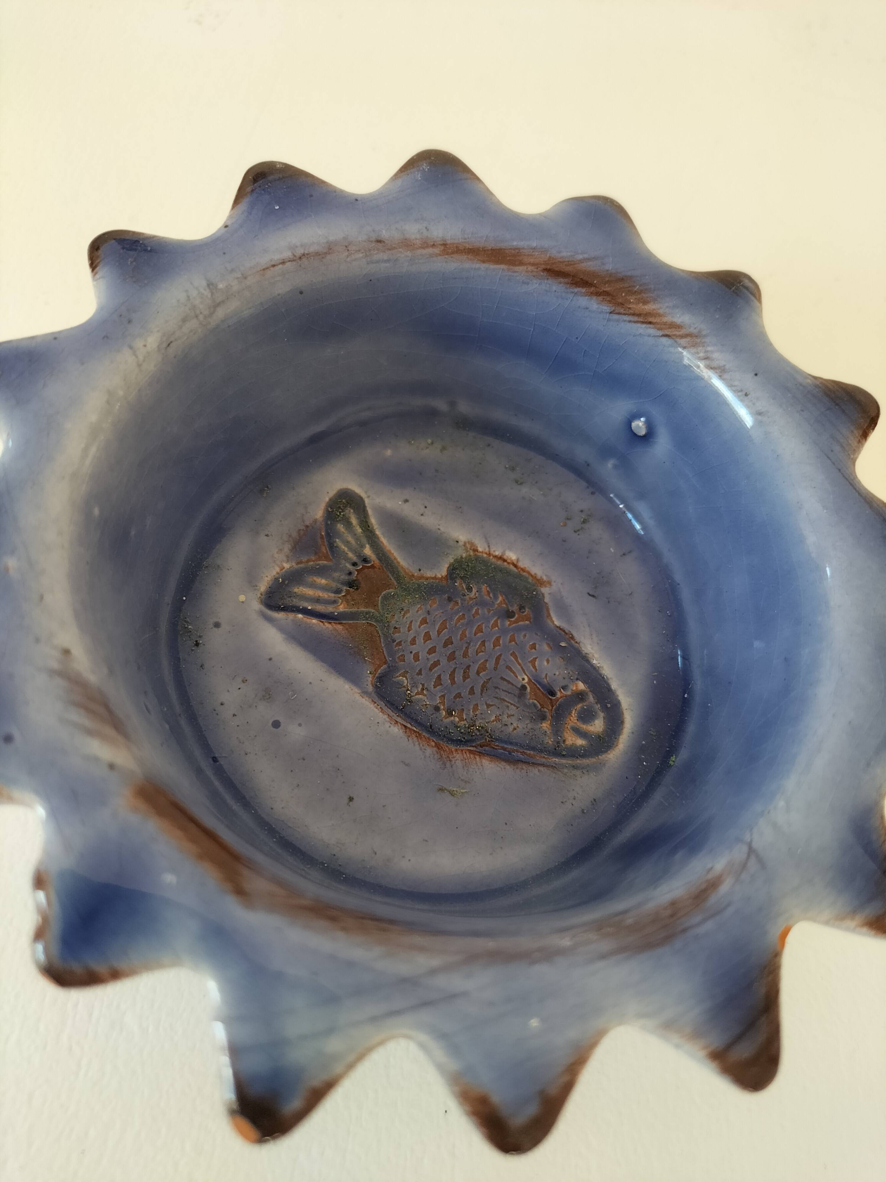 Handcrafted blue earthenware pocket emptier