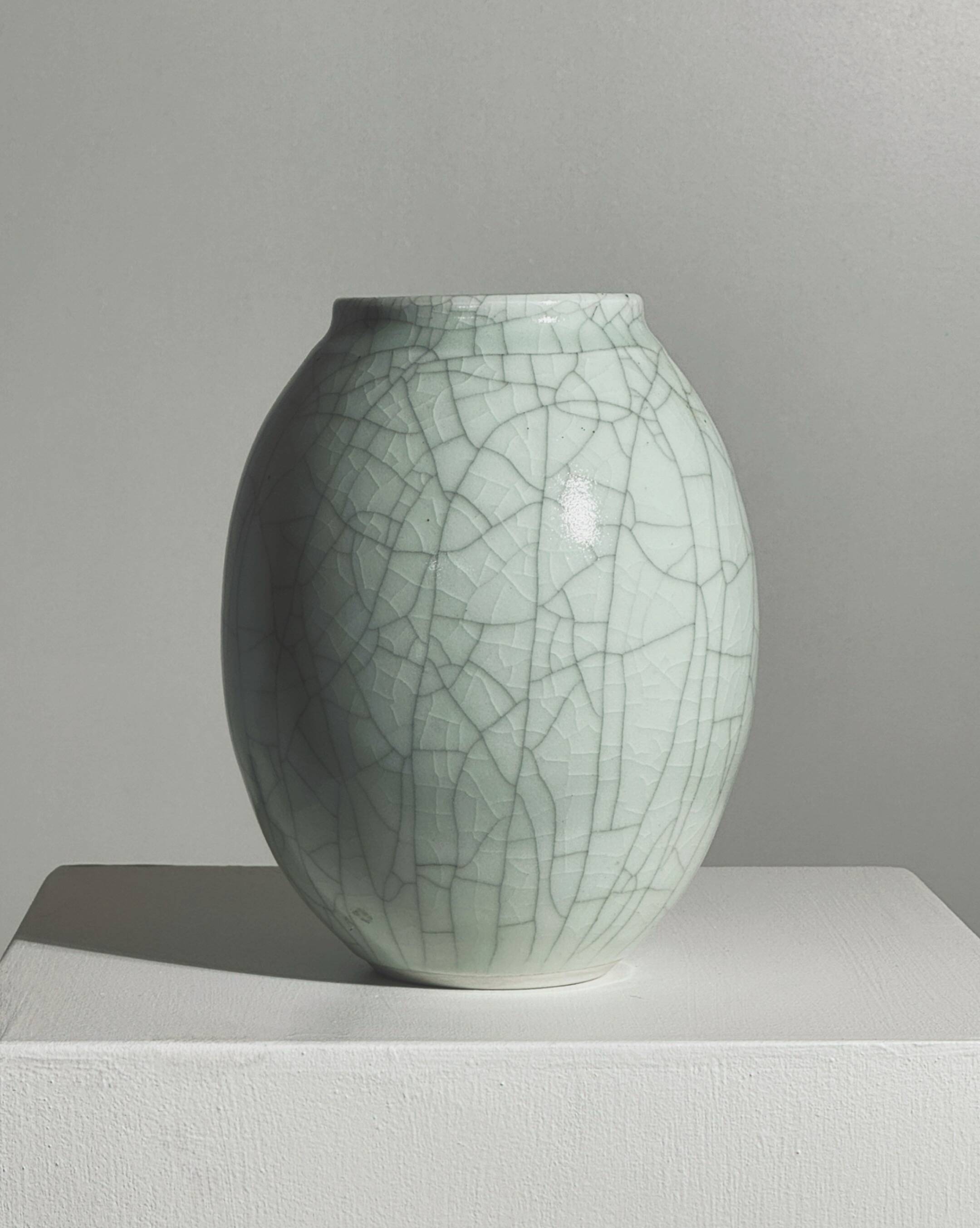 White ceramic vase by Roland Breton