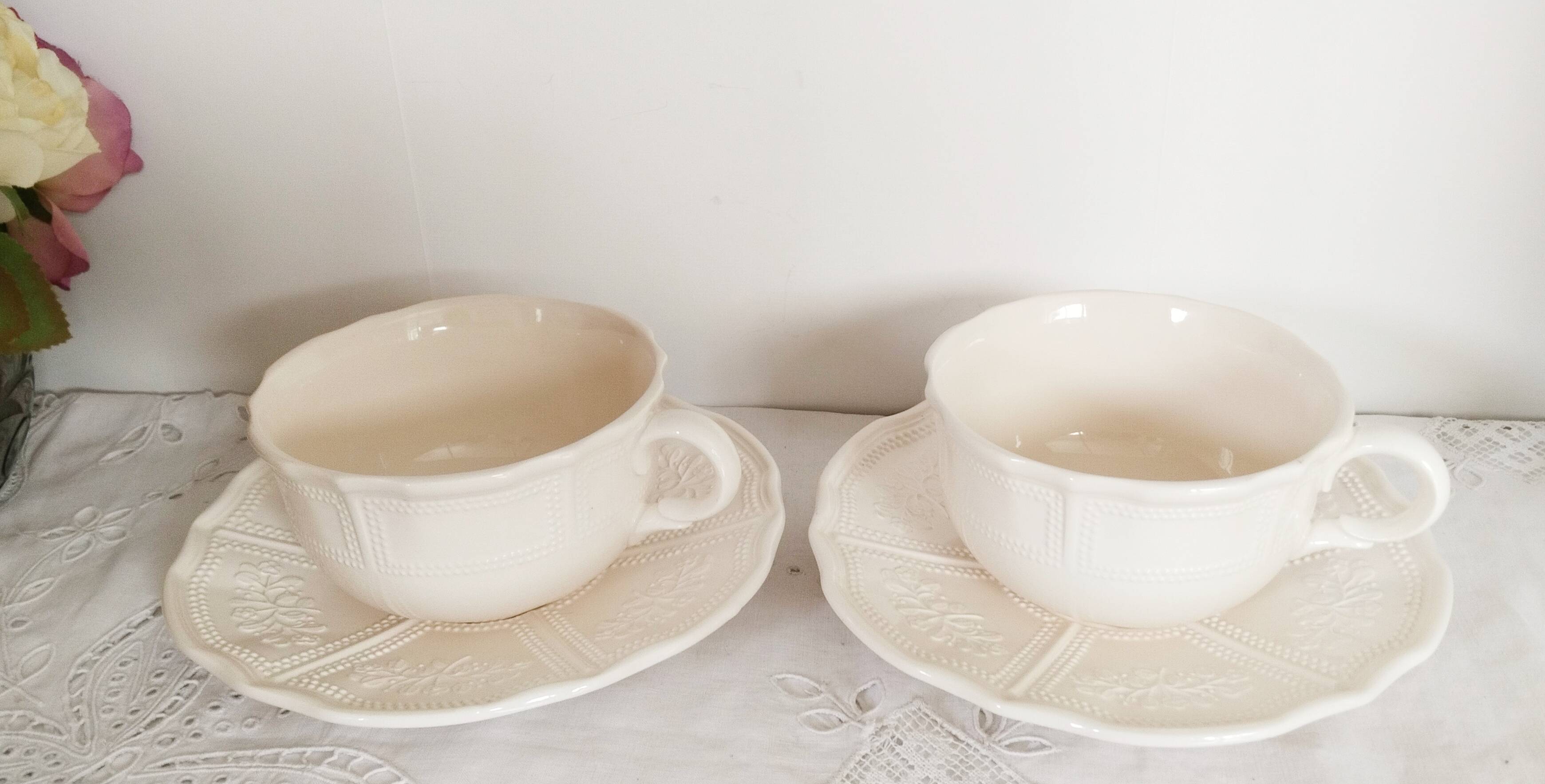 Set of 2 antique tea or chocolate cups with saucers, in earthenware from L