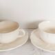 Set of 2 antique tea or chocolate cups with saucers, in earthenware from L
