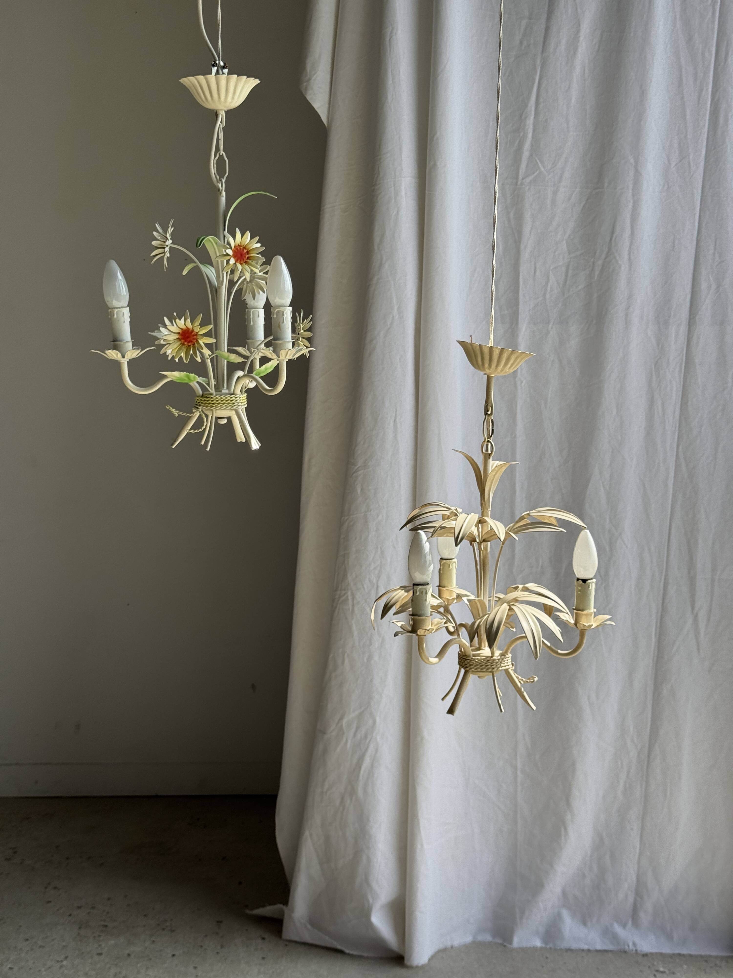 Small vintage cream metal flower chandelier with orange flowers and 3 arms.