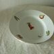 Oval dish in pâte and Limoges enamel decorated with four seasons vegetables.