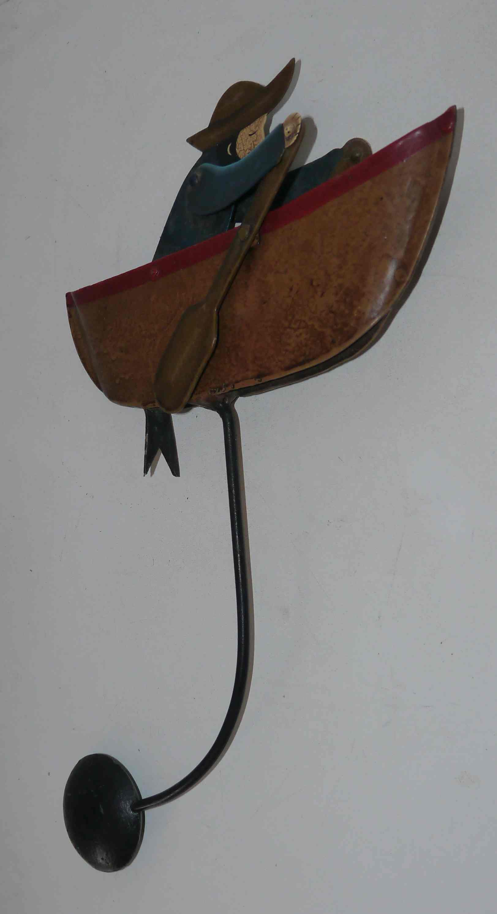 Old fishing counter balance toy in a boat