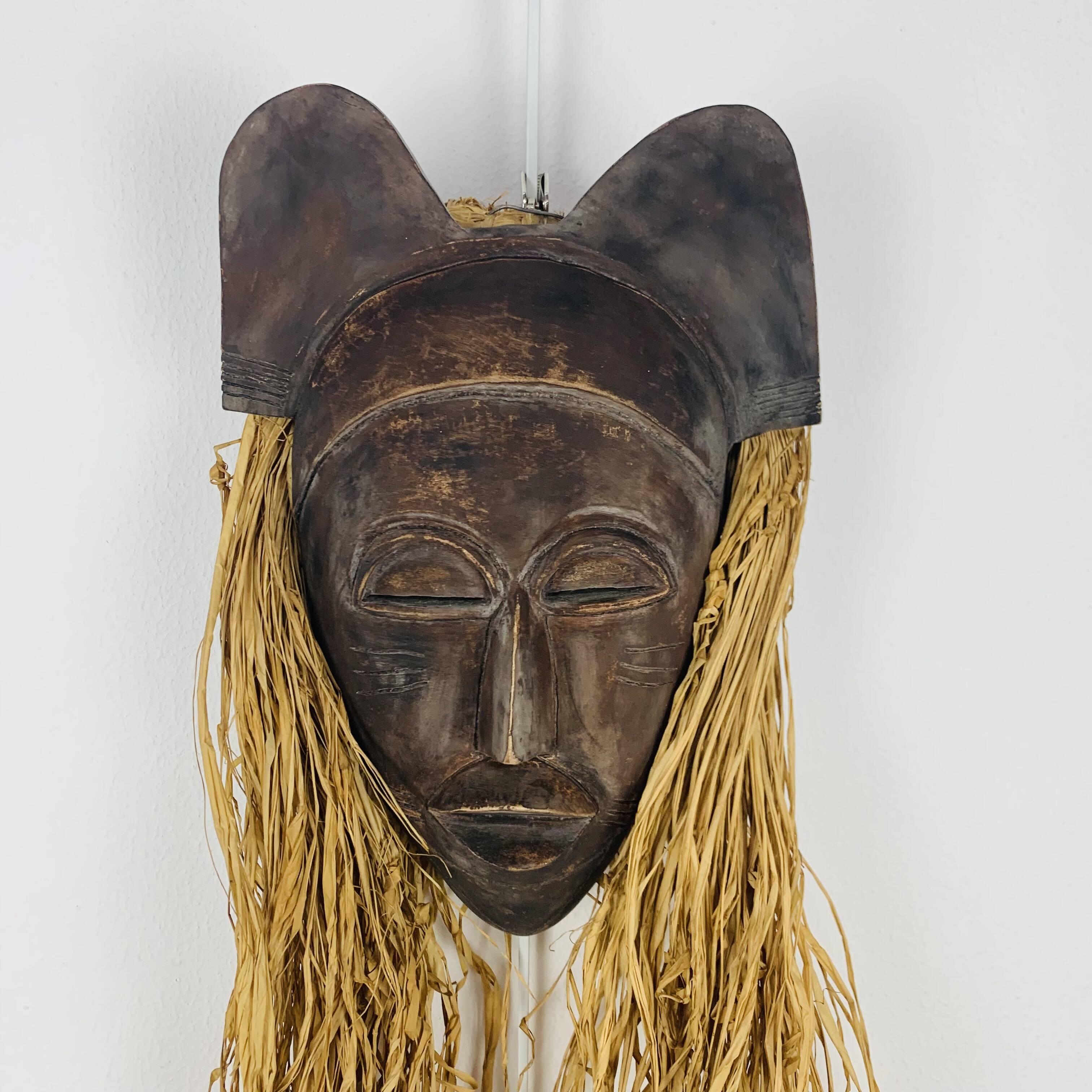 African ceramic and raffia mask signed BJ