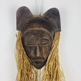 African ceramic and raffia mask signed BJ