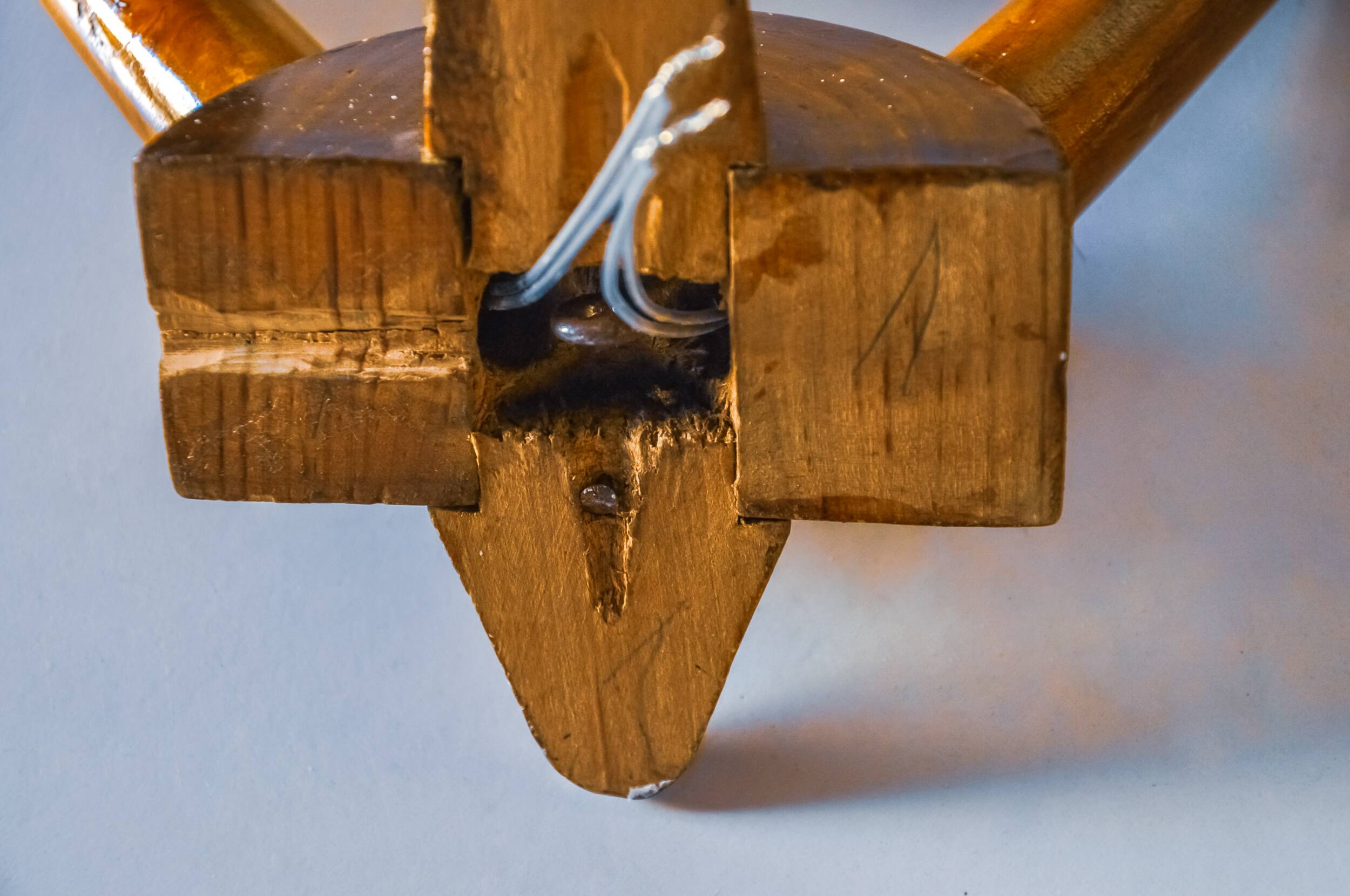 Pair of two-armed art deco "ball" wall lights, carved wood, France, 1960