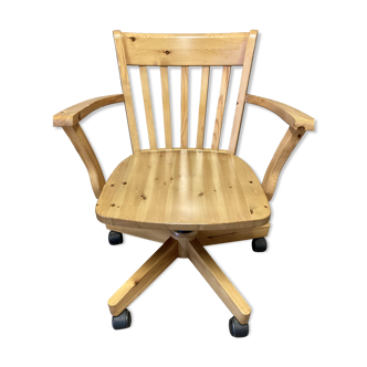 Swivel and recliner armchair in solid pine.